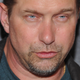 Illustration for article titled Stephen Baldwin and Kevin Costner Face Off in Squinty Medium-Famous Goateed Man-Feud